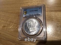 1879 P Morgan Silver Dollar PCGS MS64 With Gold Shield Protection