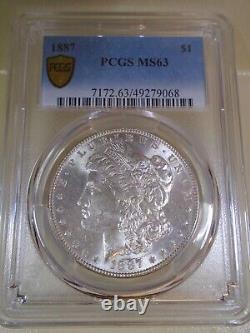 1887 $1 MORGAN (VIBRANT RAINBOW REVERSE) PCGS MS 63 GOLD SHIELD With A TRU VIEW